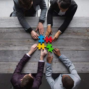 Business people assembling puzzle, Stock Photos