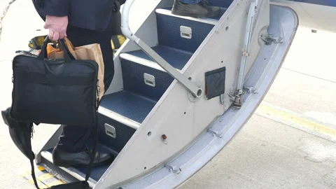 Business people boarding a corporate jet in 4K Slow motion Stock Footage 87768197