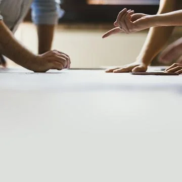 Business people brainstorming using a chart Stock Photos