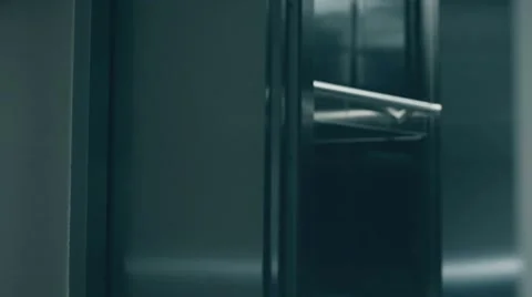Business people call an elevator, get in when it arrives Stock-Footage 60764798