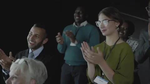 Business people clapping after a multi screen presentation by office colleague Stock Footage 138083734