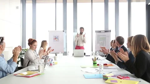 Business people clapping after presentation of their colleague Stock Footage 59544166