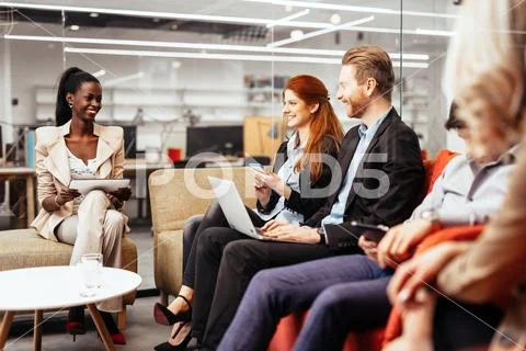 Business people collaborating in office and working on project together Stock Photos