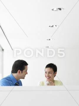 Business People Conversing During Coffee Break Stock Photos