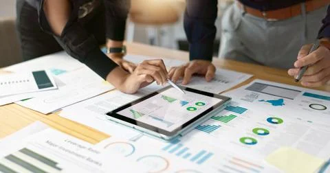 Business people, data analysis with tablet and paperwork, hands with online Stock Photos