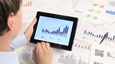 Business people developing a business project and analyzing market data. Stock Footage 40974955