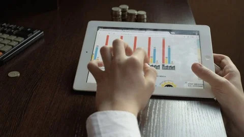 Business people developing a business project and analyzing market data Stock Footage 71340758