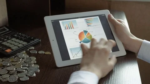 Business people developing a business project and analyzing market data Stock Footage 71340987