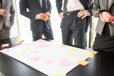 Business people developing plan on office desk Stock Photos