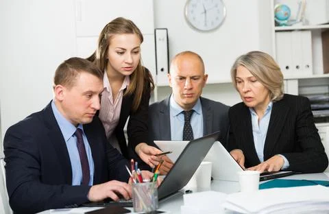 Business people developing strategy for teamwork in modern office Stock Photos