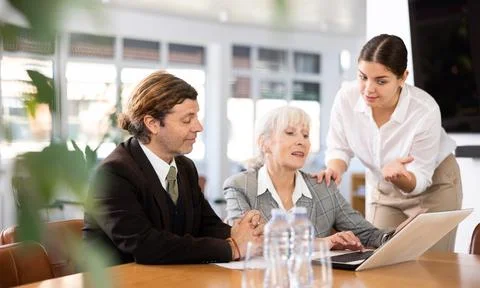 Business people developing strategy for teamwork at table in office Stock Photos