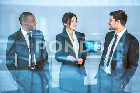 The business people discuss over the window Stock Photos