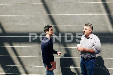 Business people discussing news Stock Photos