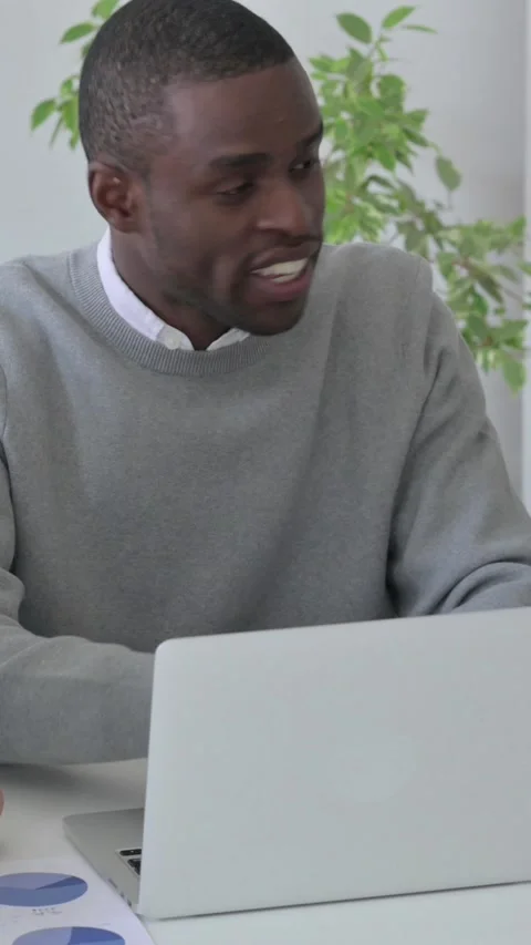 Business People Discussing while using Laptop in Office, Vertical Video Stock Footage 340035988