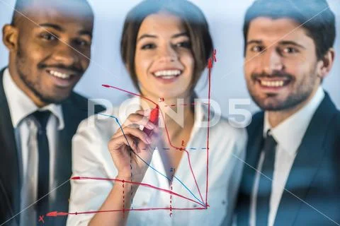 The business people draw the graph at the virtual screen Stock Photos