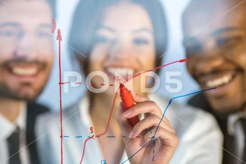 The business people draw the graph at the virtual screen Stock Photos