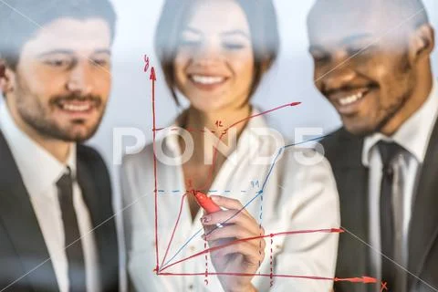 The business people draw the graph at the virtual screen Stock Photos