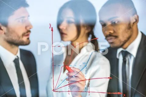 The business people draw the graph at the virtual screen Stock Photos