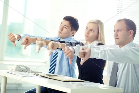 Business people estimating negatively speech at conference Stock Photos
