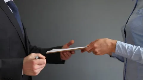 Business people examining document Stock Footage 67700802