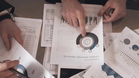 Business people exchanging documents, closeup shot Stock Footage 69134279