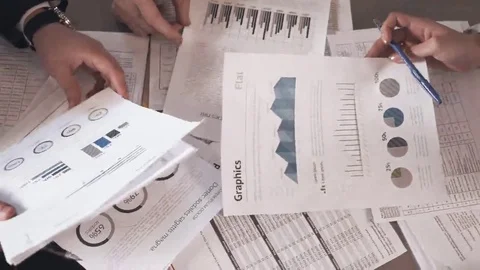 Business people exchanging documents, closeup shot Stock Footage 69138668