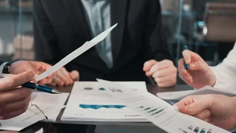 Business people exchanging documents, closeup shot Stock Footage 82066711