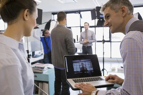 Business people filming in-house tutorial video 写真素材