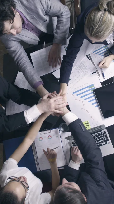 Business people forming hands stack Stock Footage 226538075