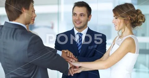 Business people group joining hands Stock Photos