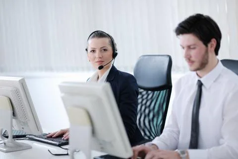 Business people group working in customer and helpdesk office Stock Photos
