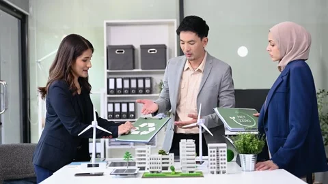 Business people having consultation about wind energy at company office. Bu.. Stock Footage 312980853