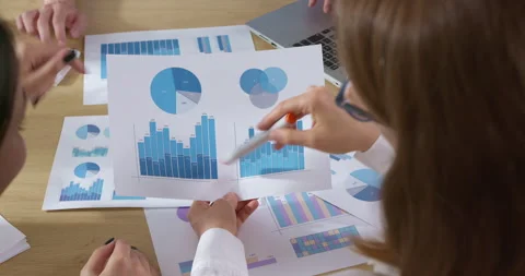 Business people look at statistical data on paper. Financiers analyze reports  스톡 동영상 210148597