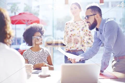 Business people meeting in sunny office Stock Photos