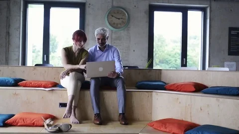 Business people in the office consulting a project. Stock Footage