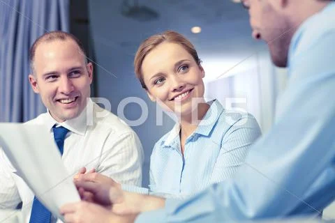 Business people with papers meeting in office Stock Photos