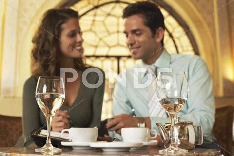 Business People Planning Schedule In Restaurant Stock Photos