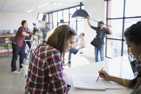 Business people planning video tutorial Stock Photos