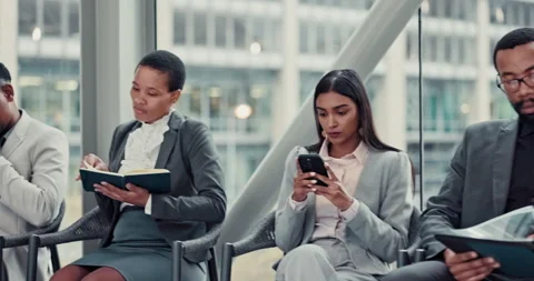 Business people, queue and notes for interview with tech, books or tablet to Stock Footage 294883700
