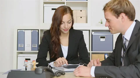 Business people shake hands after meeting Stock Footage 32246296