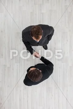 Business people shaking hands Stock Photos