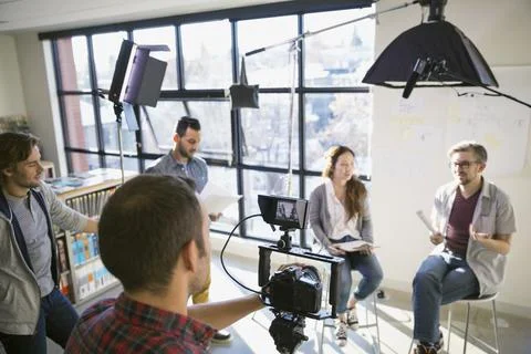 Business people shooting video tutorial 写真素材