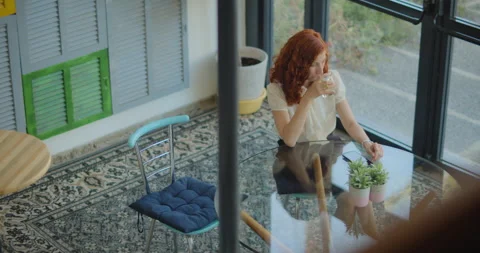Business people sitting at the coffee table, talking to each other and drinki Stock Footage 146200628