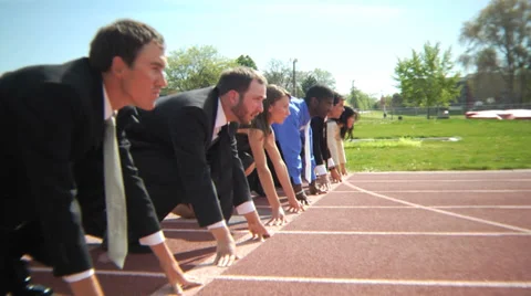 Business people at starting line Stock Footage