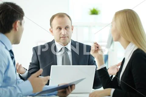 Business people submitting proposals at meeting Stock Photos