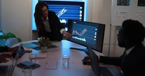 Business people talking about new trading strategies inside bank meeting room Stock-Footage 155332353