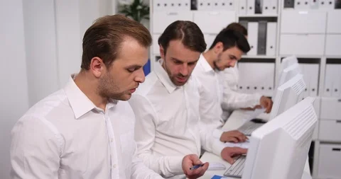 Business People Talking Analyzing Work on Computer and Pie Chart in Office Room Stock Footage 88047931