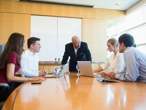 Business people talking in meeting Stock Photos