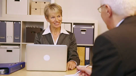 Business people talking in office Stock Footage 34372086