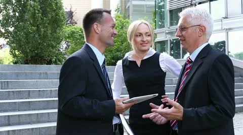 Business people talking together Stock Footage 12228014